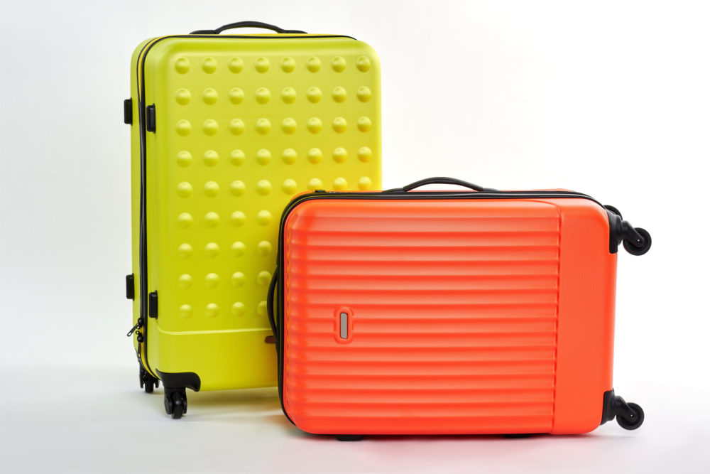 pair-of-colorful-suitcases-2021-08-31-23-43-04-utc-scaled-e1668471027555